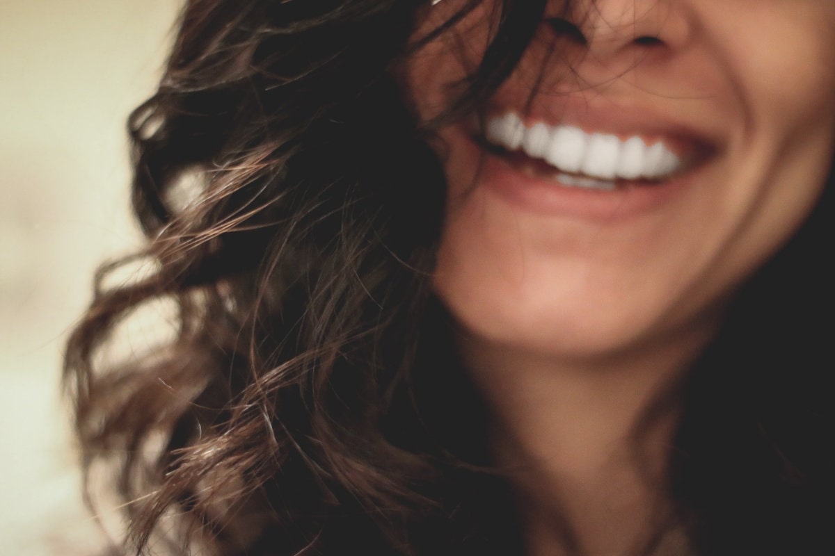 An image of a woman smiling
